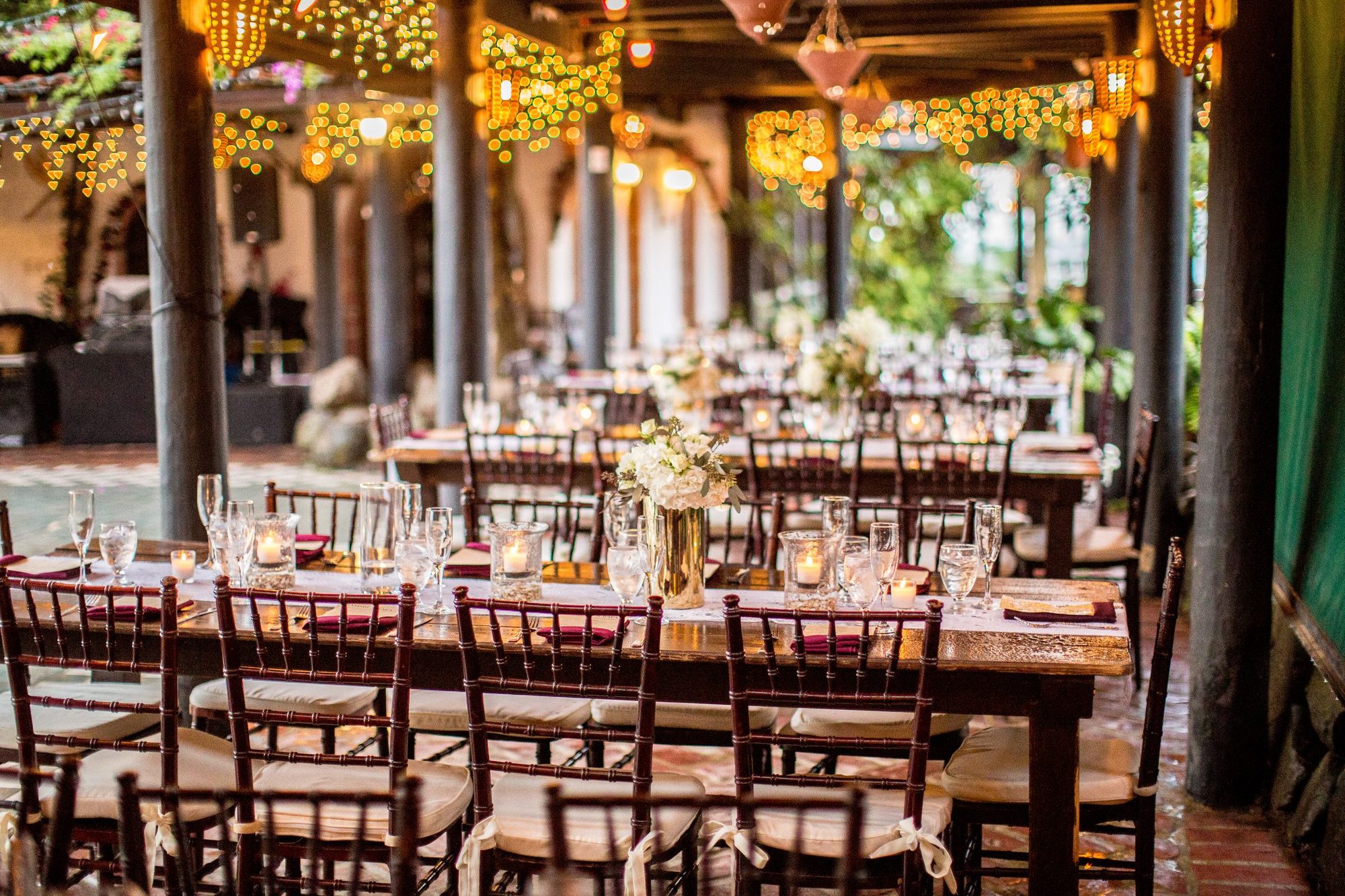 Candlelit reception table with florals and glassware